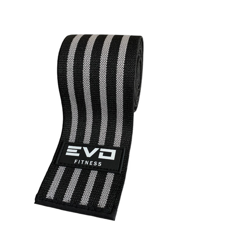 Black and gray elastic training knee wraps with EVO Fitness logo.