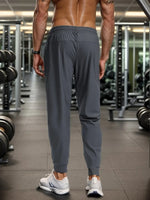 Pantalón Jogger Deportivo Hombre Gris Evo Fitness Cierres