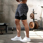 Short con calza negro y gris militar